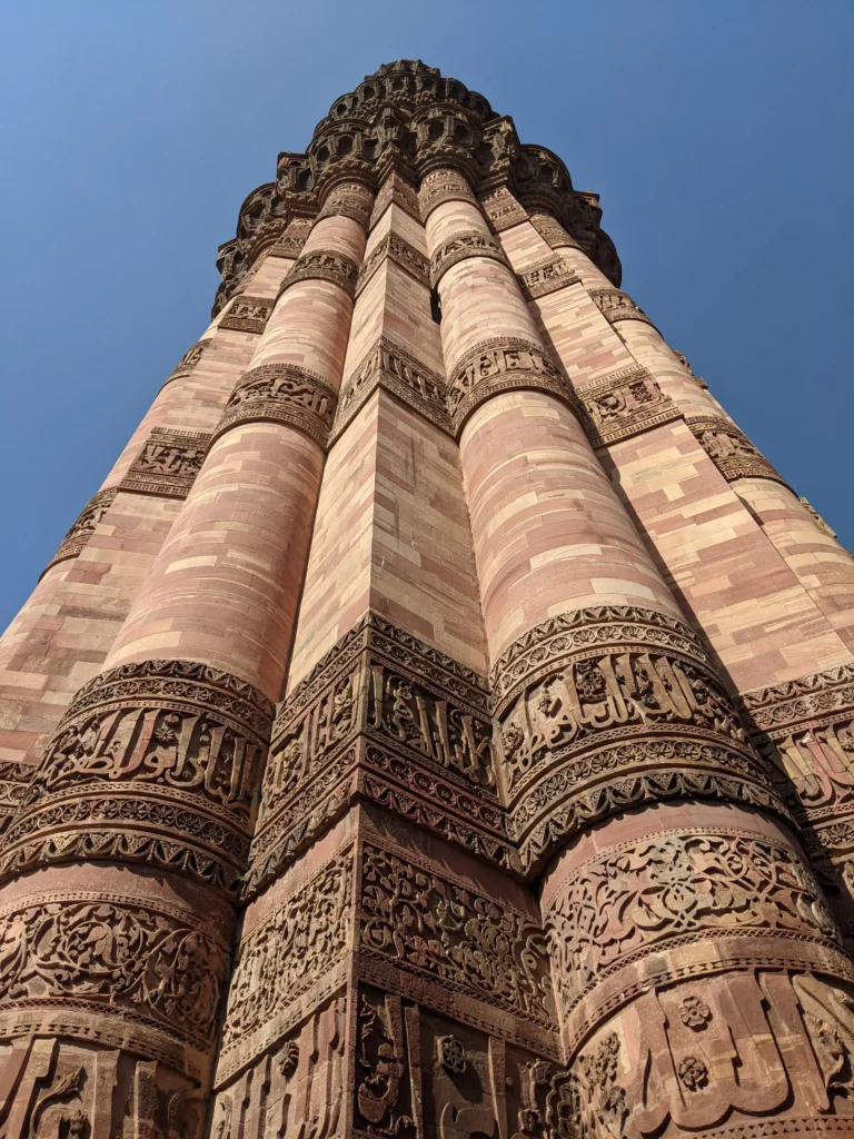 Inscriptions near the base Qutb Minar Inscriptions near the base
