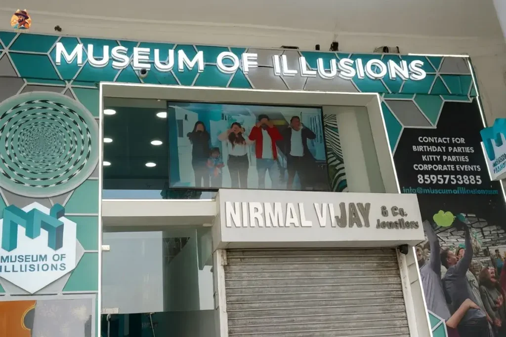 Main entrance of Museum of Illusions Delhi with teal signage in Connaught Place