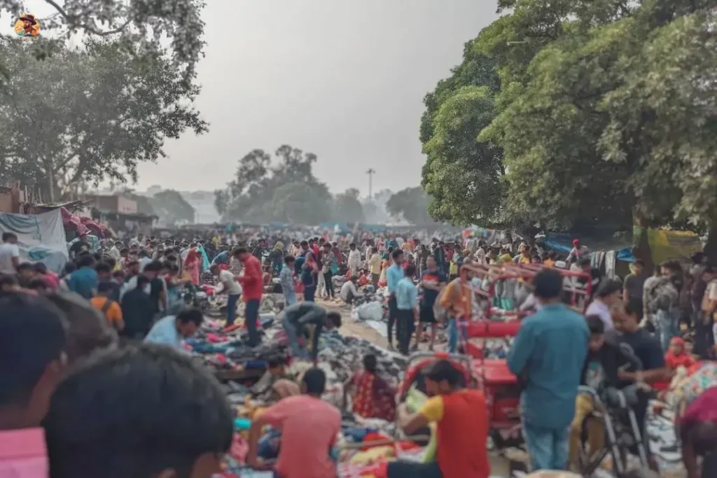 Sunday morning scene at Chor Bazaar Delhi with chaiwala and locals