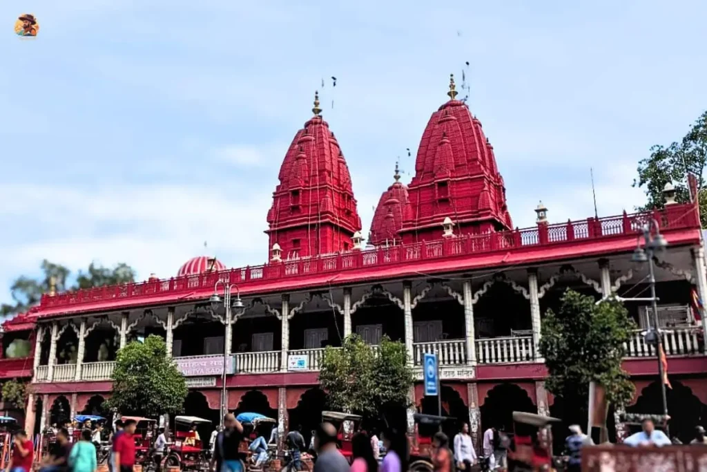 ntrance of Digambar Jain Lal Mandir Delhi seen from Chandni Chowk market street with rickshaws and visitors