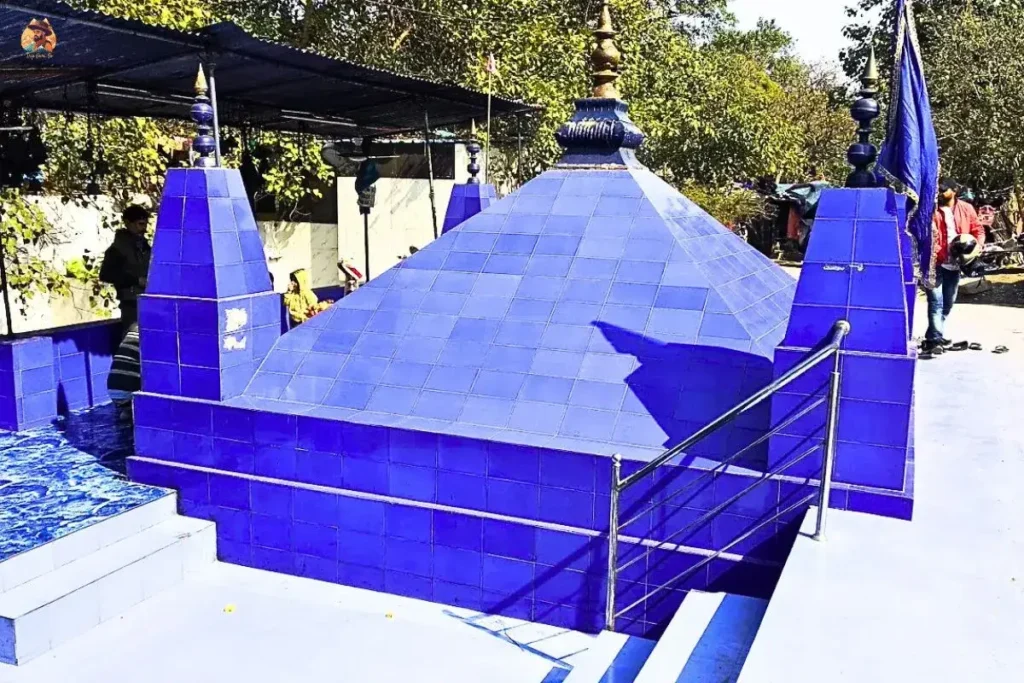 Reflection of Neeli Chhatri Temple blue dome during sunrise near Yamuna Ghat in Old Delhi
