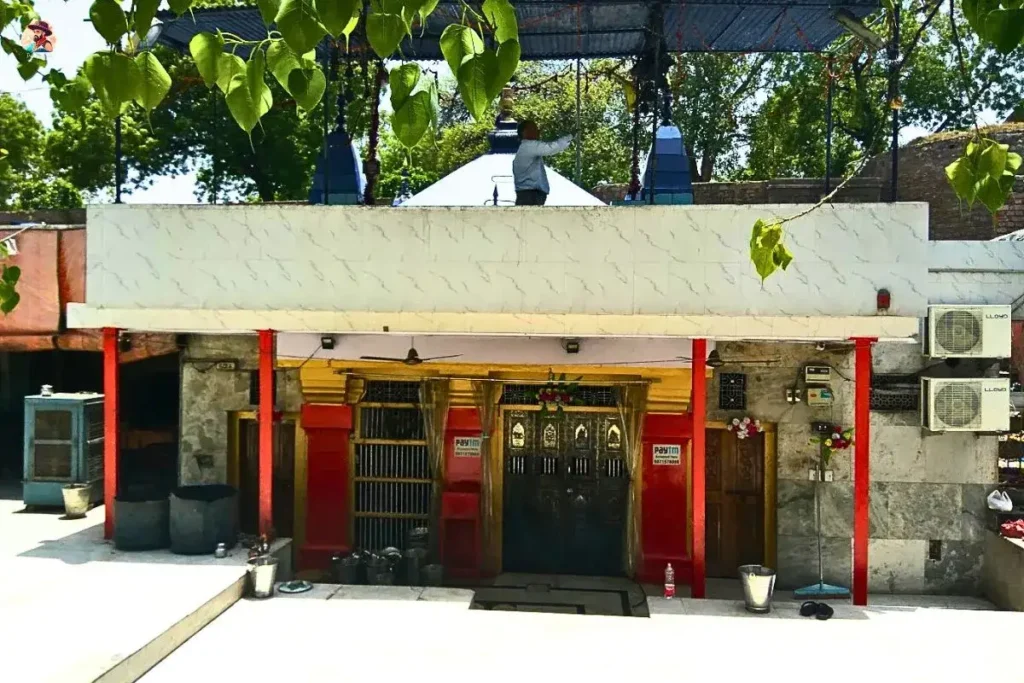 Neeli Chhatri Temple Delhi blue dome and courtyard view under morning sunlight
